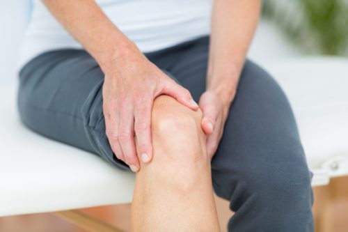 Woman having knee pain